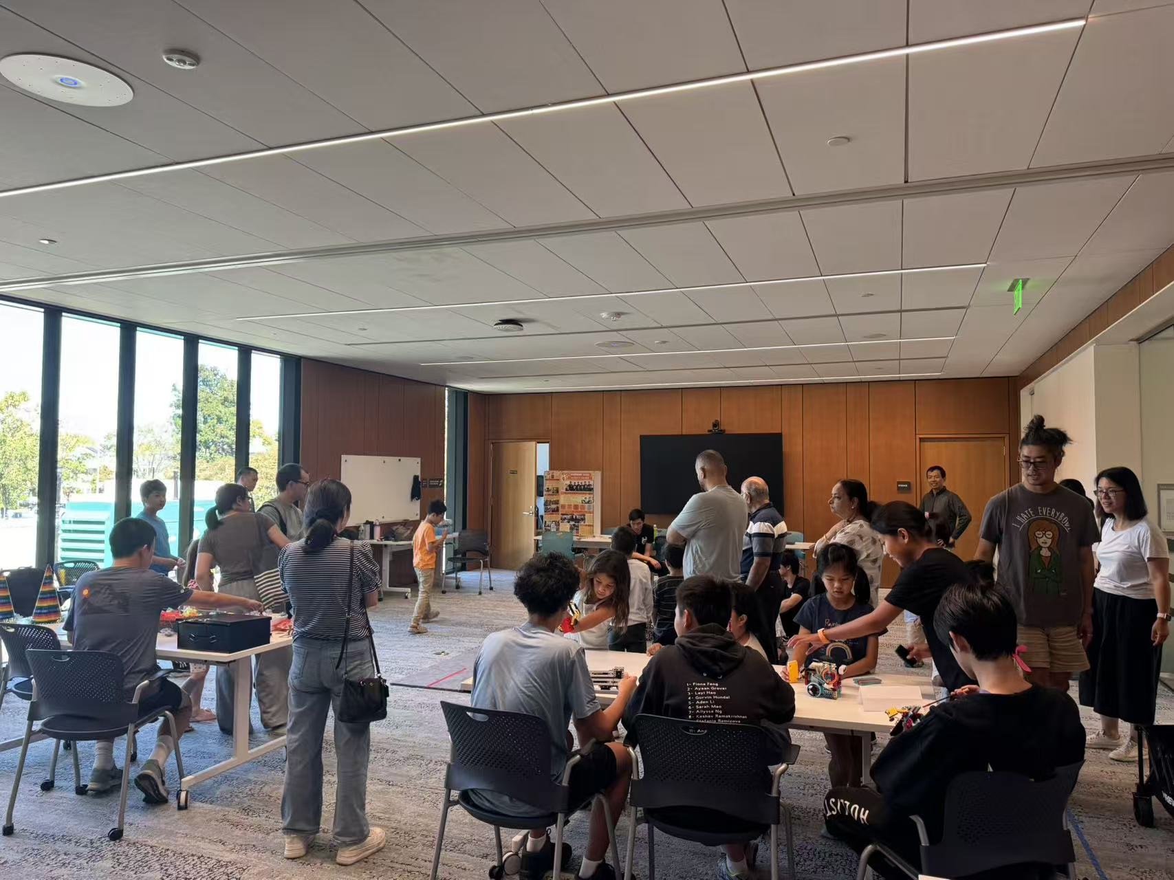 Families exploring activities at Paragon's Campbell Library outreach event